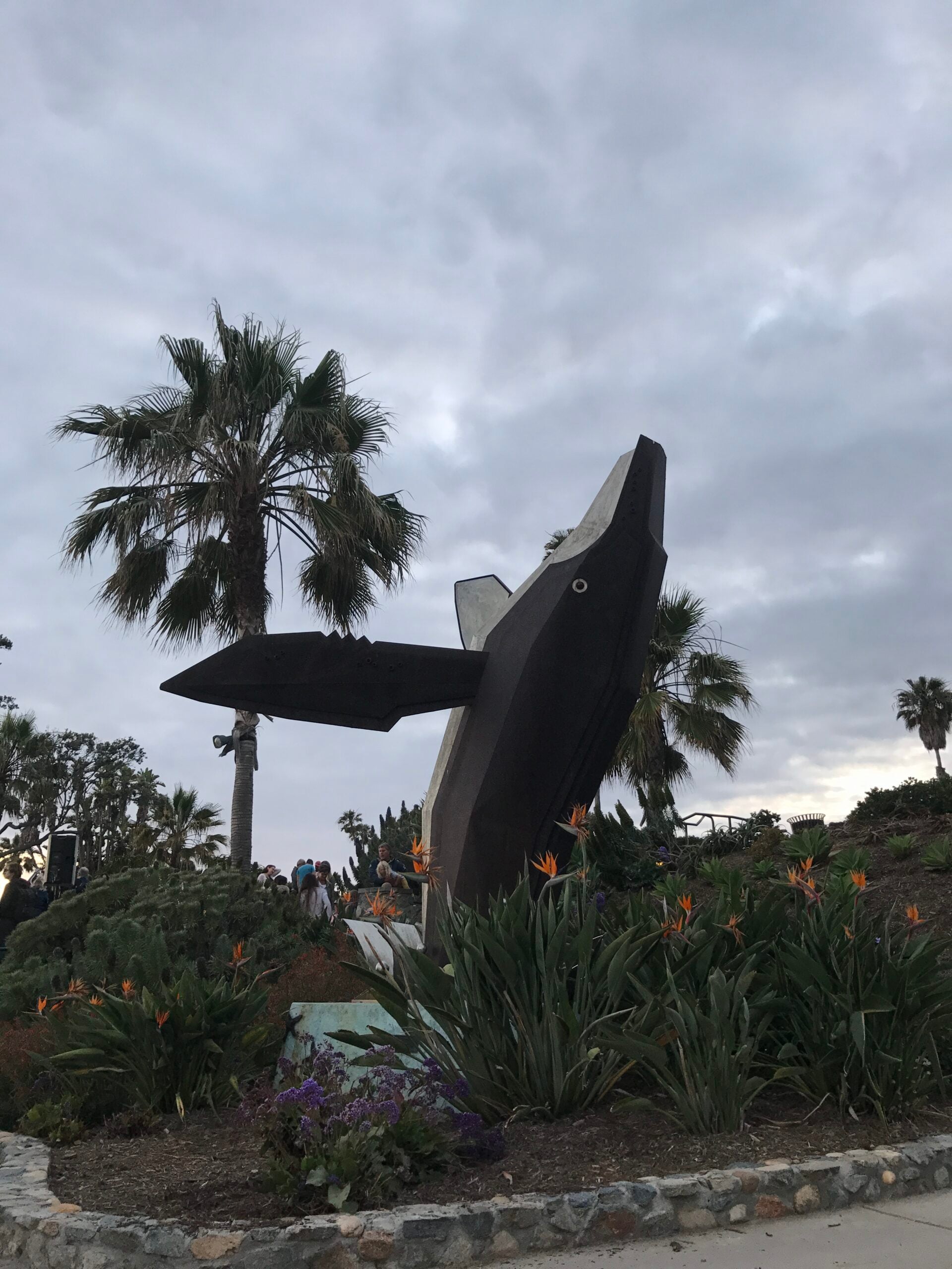 The 'Breaching Whale' sculpture by Jon Seeman at Heisler Park – A landmark of public art and coastal preservation in Laguna Beach, CA. Home of the 2026 Sunset Serenades free concert series in Laguna Beach.