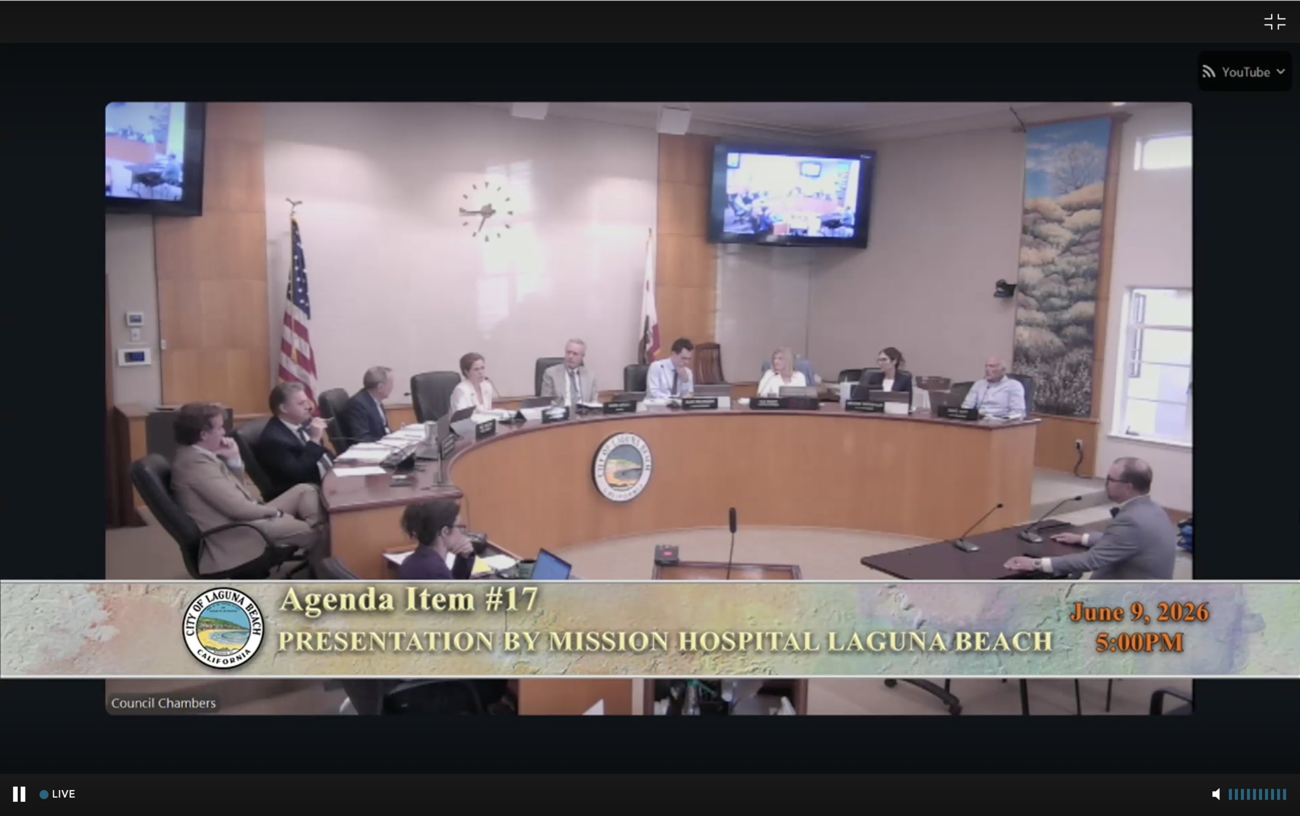 Providence Mission Hospital CEO Seth Tegan speaking at the podium to the Laguna Beach City Council during Item 18